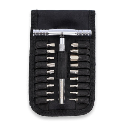 The Prestacycle T-Ratchet Pro Wallet Kit features a black pouch holding a silver reversible T-Ratchet tool and S2 Steel Hex Bits in elastic loops, all neatly organized and visible from a top-down view.
