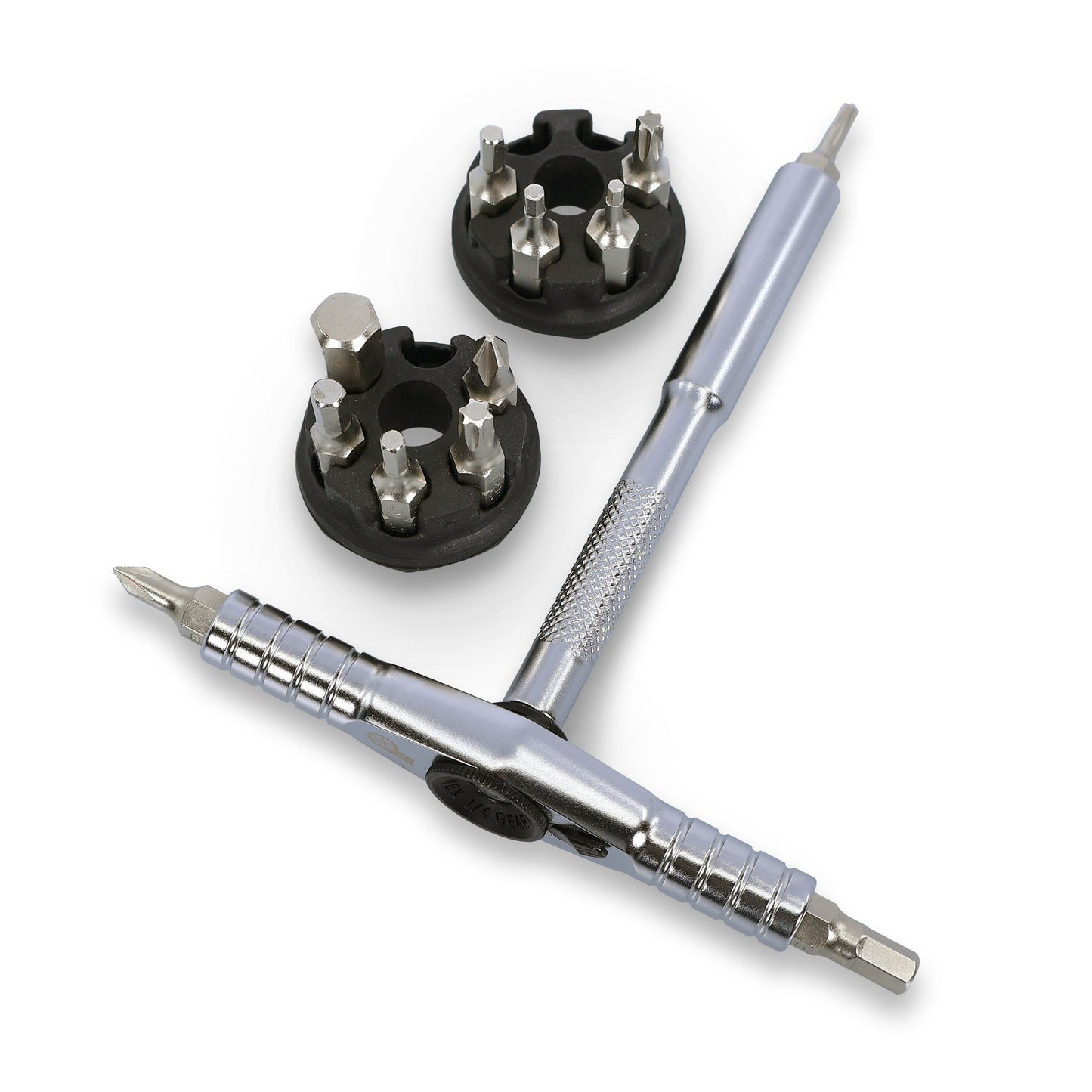 The Prestacycle T-Ratchet Pro Set is a metal T-handle ratchet screwdriver with a reversible ratchet and interchangeable bits, shown with two round black holders containing various bits for multiple screw types and sizes.