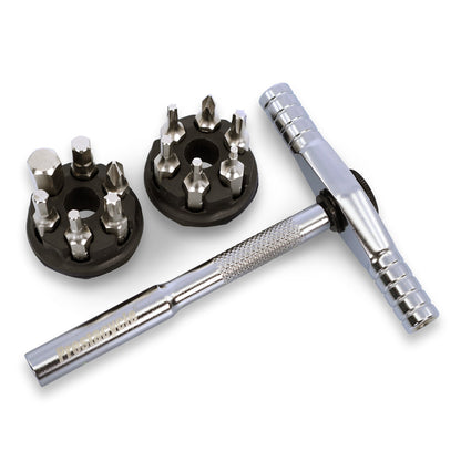 The Prestacycle T-Ratchet Pro Set features a metal T-handle ratchet with a textured grip, shown with two black circular holders containing multiple interchangeable screwdriver bits, all neatly arranged on a white background.