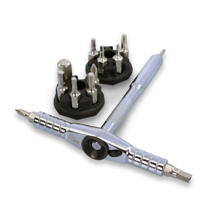 The Prestacycle T-Ratchet Pro Set features a metal T-handle ratchet screwdriver with interchangeable bits and two black bit holders, displayed on a white background—a versatile addition to any toolkit.