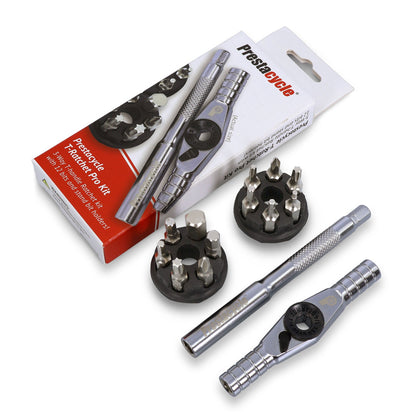 A Prestacycle T-Ratchet Pro Set with packaging, metal handle, reversible ratchet tool, and two round holders of interchangeable screwdriver bits is displayed on a white background.