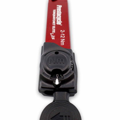 Close-up of a Prestacycle TorqRatchet ELITE Lite, a portable 2–12 Nm torque multi-tool ratchet with a black adjustment dial set to Nm and reversible ratchet for precise adjustments.